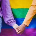 LGBTQ couple holding hands